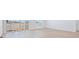 Bright living room with sliding glass doors leading to backyard at 200 Lark Sparrow Way, Bennett, CO 80102