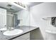 Bathroom with a large countertop, shower/tub combination, and neutral accents at 420 Wright St # 101, Lakewood, CO 80228