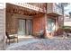 Private outdoor patio with chairs, perfect for enjoying the serene surroundings at 420 Wright St # 101, Lakewood, CO 80228