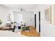 Bright and open living space showcasing a blend of living and dining areas at 1000 N Ogden St, Denver, CO 80218
