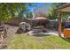Backyard patio with seating area, grill, and fire pit at 5809 E Caley Dr, Centennial, CO 80111