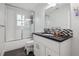 Bathroom with tub, shower, vanity, and dark countertop at 5809 E Caley Dr, Centennial, CO 80111