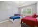 Bedroom with two twin beds, window with blinds, and a chandelier at 5809 E Caley Dr, Centennial, CO 80111