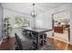 Spacious dining area with kitchen views, hardwood floors at 5809 E Caley Dr, Centennial, CO 80111