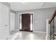 Spacious entryway with tile flooring, neutral walls, and interior doors at 5809 E Caley Dr, Centennial, CO 80111