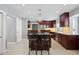 Updated kitchen with island and stainless steel appliances at 5809 E Caley Dr, Centennial, CO 80111