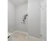 Laundry room with white walls and tile floor at 5809 E Caley Dr, Centennial, CO 80111