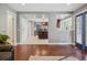Bright living room with hardwood floors and view of kitchen at 5809 E Caley Dr, Centennial, CO 80111