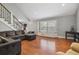 Living room features hardwood floors, bay window, and a cozy atmosphere at 5809 E Caley Dr, Centennial, CO 80111