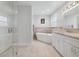 Luxurious bathroom with soaking tub and glass shower at 5809 E Caley Dr, Centennial, CO 80111