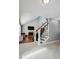 Elegant staircase with wrought iron balusters and hardwood treads at 5809 E Caley Dr, Centennial, CO 80111