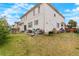 Spacious backyard with lawn and patio awaiting your personal touch and landscaping ideas at 20292 E 47Th Ave, Denver, CO 80249
