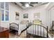 Bright bedroom with wood flooring, two beds, and ample space at 290 W 12Th Ave # 303, Denver, CO 80204
