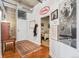 Inviting hallway with beautiful flooring, decor, and a view of the bedroom at 290 W 12Th Ave # 303, Denver, CO 80204