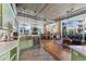 Open living space featuring a modern kitchen with stainless steel appliances and great natural light at 290 W 12Th Ave # 303, Denver, CO 80204