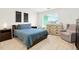 Cozy bedroom with a comfortable bed, and lots of natural light at 21528 E 59Th Pl, Aurora, CO 80019