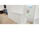 Bright upstairs hallway with carpet and access to all bedrooms at 21528 E 59Th Pl, Aurora, CO 80019