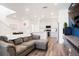 Bright and airy living space flowing into a modern kitchen area at 21528 E 59Th Pl, Aurora, CO 80019
