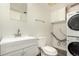 Bright laundry room features a vanity, toilet, and washer/dryer hookups at 4950 Homestead Pl # 23, Thornton, CO 80229