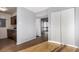 Open living space with the kitchen to the left and a large closet to the right at 4950 Homestead Pl # 23, Thornton, CO 80229