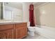 Functional bathroom with a vanity, toilet, and shower, providing essential amenities in a compact space at 23561 Genesee Village Road # C, Golden, CO 80401