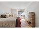 Bright bedroom with a comfortable window seat and ample sunlight for a cozy living space at 23561 Genesee Village Road # C, Golden, CO 80401