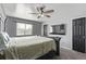 Spacious main bedroom featuring a ceiling fan and carpet flooring providing a comfortable space at 19228 E Arizona Pl, Aurora, CO 80017