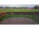 View of a large sports field from the backyard deck of the home at 880 Orion Dr, Lafayette, CO 80026