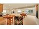 Spacious finished basement with a pool table, wet bar, and built-in entertainment center at 9784 S Iris Ct, Littleton, CO 80127