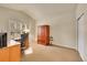 Bright office space with carpeted floors and closet space at 9784 S Iris Ct, Littleton, CO 80127