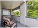 A serene balcony with seating, offering a peaceful outdoor retreat surrounded by greenery at 2898 W 22Nd Ave, Denver, CO 80211
