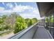 Enjoy a view of lush greenery and the city skyline from this spacious balcony at 2898 W 22Nd Ave, Denver, CO 80211