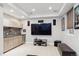 Finished basement with a wet bar, large screen television, and comfortable seating at 2898 W 22Nd Ave, Denver, CO 80211
