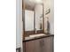 Bathroom featuring a modern vanity with a gray countertop and stylish fixtures at 2898 W 22Nd Ave, Denver, CO 80211