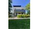 Modern home featuring a manicured lawn and contemporary architectural design at 2898 W 22Nd Ave, Denver, CO 80211