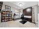 Functional home office with a Murphy bed, built-in desk, and ample shelving at 2898 W 22Nd Ave, Denver, CO 80211