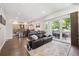 Open-concept living space featuring modern furnishings, hardwood floors, and natural light at 2898 W 22Nd Ave, Denver, CO 80211