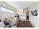 Bright living room with modern furniture and a large window at 2898 W 22Nd Ave, Denver, CO 80211