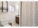 Well-lit bathroom features modern fixtures and a shower, providing a comfortable and functional space at 4344 Chase St, Denver, CO 80212