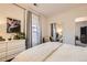Bedroom featuring a bright window, soft textures, and ample closet space, creating a serene retreat at 4344 Chase St, Denver, CO 80212