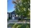 Charming home with gray siding, a white door, and neatly trimmed landscaping adding to its curb appeal at 4344 Chase St, Denver, CO 80212