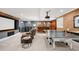 Finished basement with a home theater, ping pong table, and wet bar at 1164 S High St, Denver, CO 80210