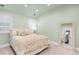 Cozy bedroom with soft colors, plush bedding, and comfortable furnishings at 1164 S High St, Denver, CO 80210