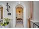 Charming front entrance with arched doorway, detailed wreath, and stylish welcome mat at 1164 S High St, Denver, CO 80210