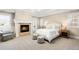Serene main bedroom with fireplace, and backyard access offers a private retreat at 1164 S High St, Denver, CO 80210