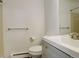 Bathroom featuring a toilet, towel rack, mirror, and a sleek white vanity at 3525 28Th St # 304, Boulder, CO 80301