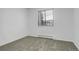 Cozy bedroom featuring a large window for natural light and neutral carpet at 3525 28Th St # 304, Boulder, CO 80301