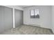 Bedroom featuring plush carpeting, a window with blinds, and a closet with sliding doors at 3525 28Th St # 304, Boulder, CO 80301