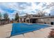 View of community pool covered, showcasing nearby buildings and landscaping at 3525 28Th St # 304, Boulder, CO 80301