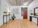 Open entryway with modern decor, hardwood floors, and bright natural lighting at 1449 Wynkoop St # 305, Denver, CO 80202